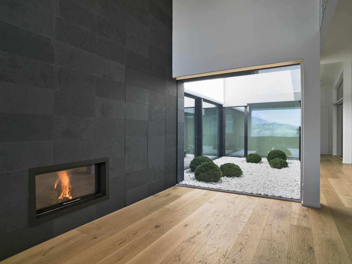 Modern Living Room Interior with Fireplace and Parquet Floor